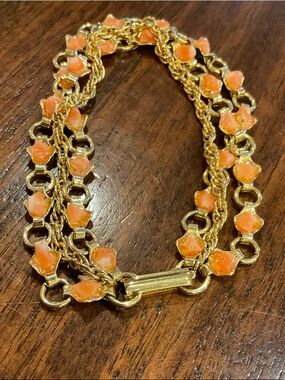 Multi Strand Gold-tone Bracelet with Orange Enamel Accents